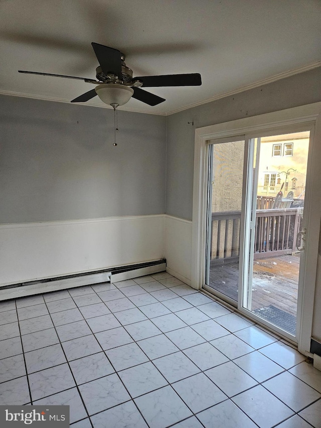 spare room with light tile patterned flooring, a baseboard radiator, and crown molding