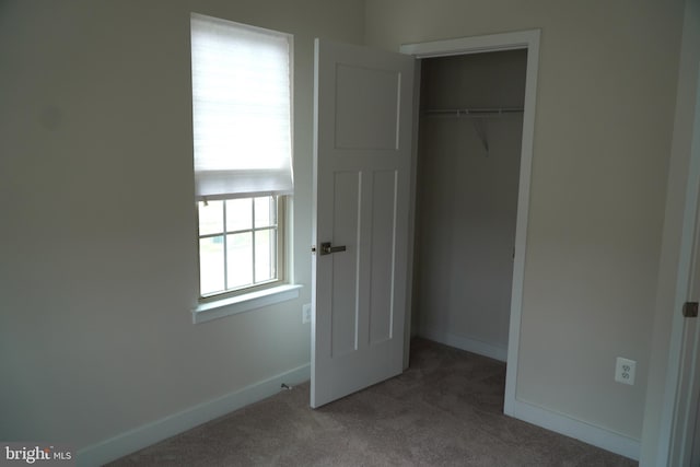 14717 Mattawoman Dr, Brandywine, MD 20613 - unfurnished bedroom with carpet flooring, a closet, and baseboards