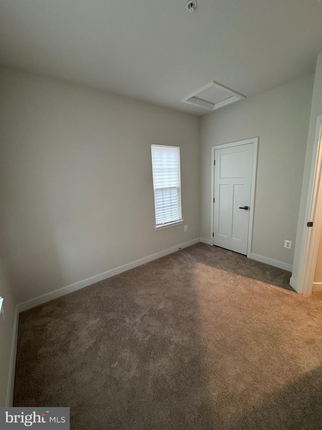 14717 Mattawoman Dr, Brandywine, MD 20613 - unfurnished bedroom with carpet flooring, attic access, and baseboards