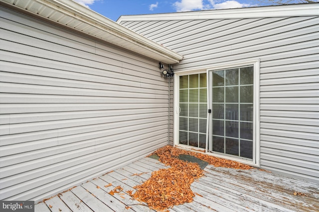 entrance to property with a deck