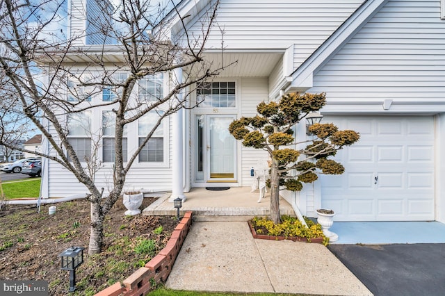 entrance to property featuring driveway