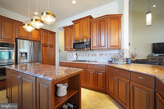 kitchen featuring stainless steel appliances, ornamental molding, backsplash, and light stone counters