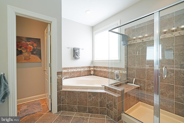 full bath featuring a garden tub, tile patterned floors, and a stall shower