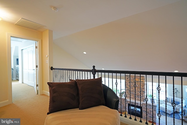 sitting room featuring carpet flooring and baseboards