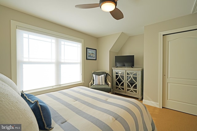 bedroom featuring baseboards and a ceiling fan