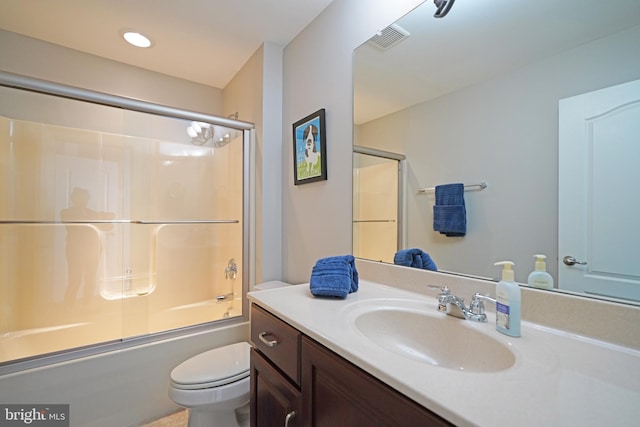 full bathroom with visible vents, toilet, enclosed tub / shower combo, vanity, and recessed lighting