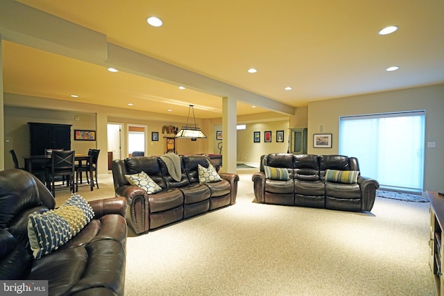 carpeted living room with recessed lighting