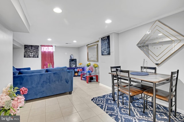 tiled dining area with baseboards, ornamental molding, and recessed lighting