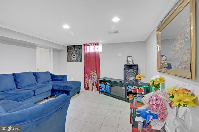 tiled living area with recessed lighting and visible vents