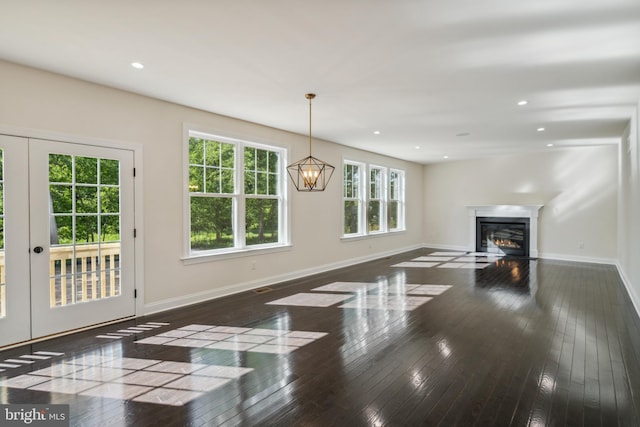 living room with baseboards and hardwood / wood-style floors