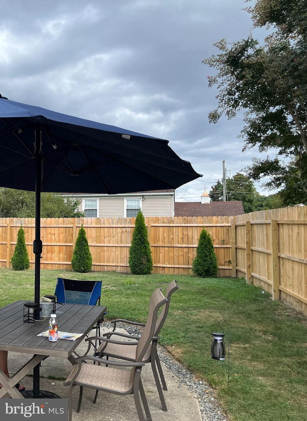 view of patio / terrace featuring outdoor dining area and fence private yard