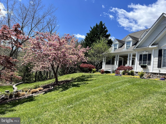 view of yard featuring a porch