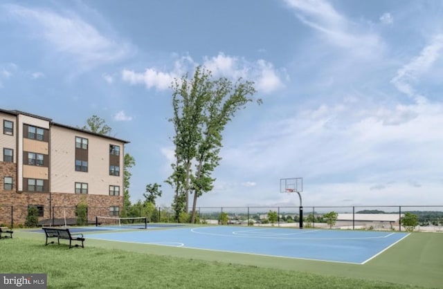 view of sport court with community basketball court and fence