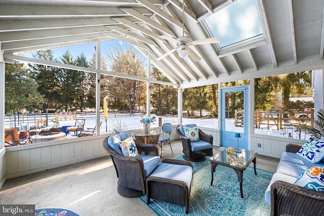 sunroom / solarium with lofted ceiling and ceiling fan