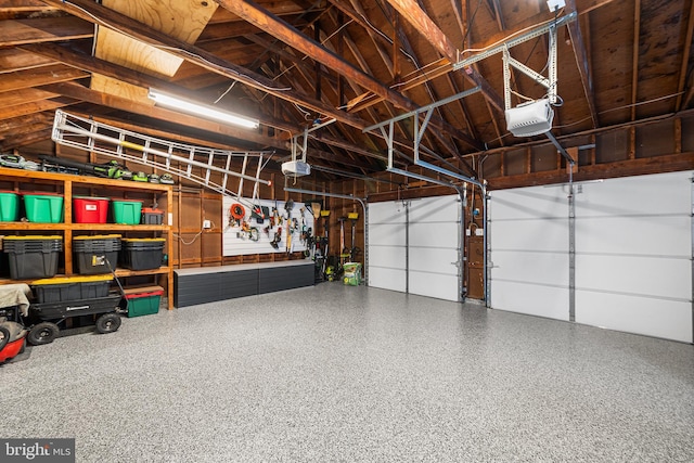 garage featuring a garage door opener