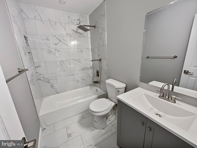 bathroom featuring toilet, marble finish floor, shower / bathing tub combination, and vanity