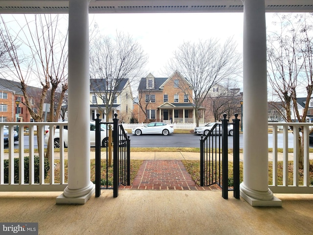 view of gate with a residential view