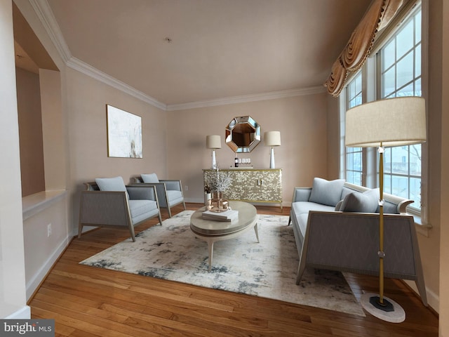 sitting room with hardwood / wood-style flooring, baseboards, and crown molding