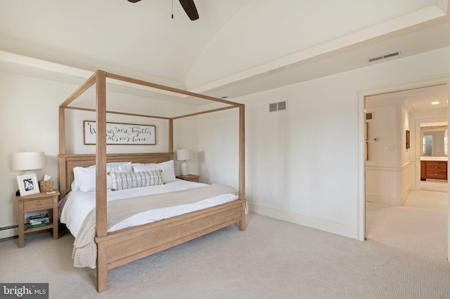 carpeted bedroom featuring vaulted ceiling, baseboards, visible vents, and a ceiling fan