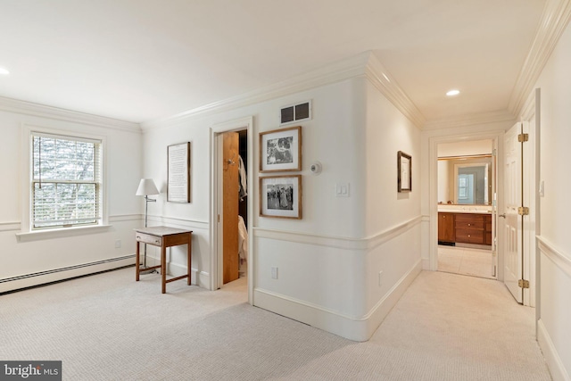 hall featuring ornamental molding, light colored carpet, a baseboard heating unit, and visible vents