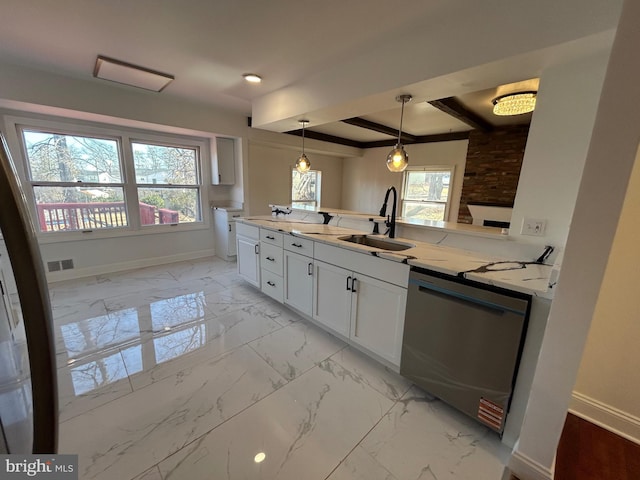 kitchen with a sink, marble finish floor, a healthy amount of sunlight, and stainless steel dishwasher