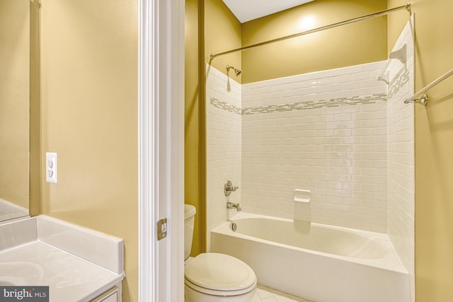 bathroom featuring tub / shower combination, vanity, toilet, and tile patterned floors