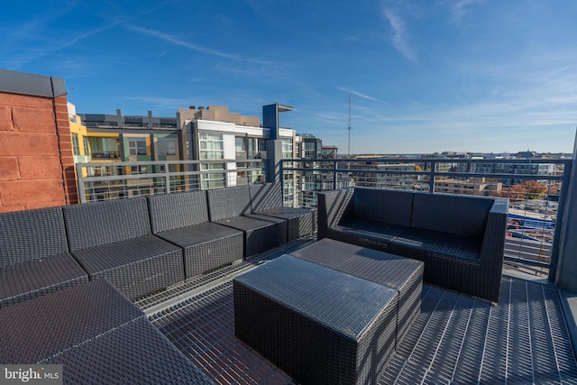 wooden terrace featuring an outdoor hangout area