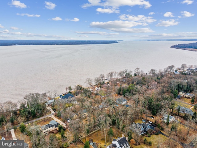 drone / aerial view with a water view