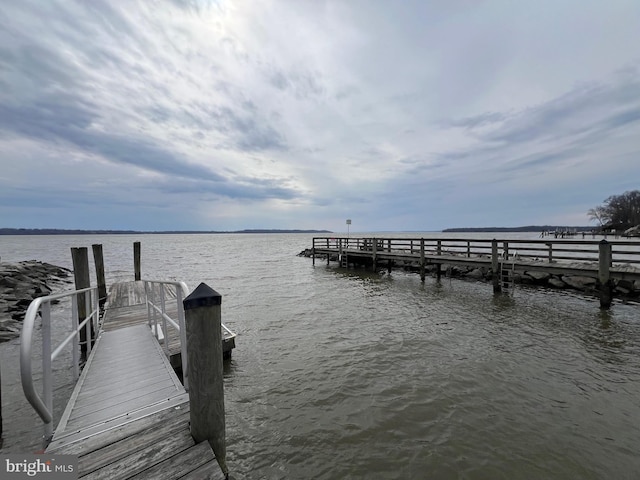 view of dock featuring a water view