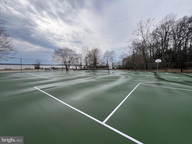 view of sport court with community basketball court and fence