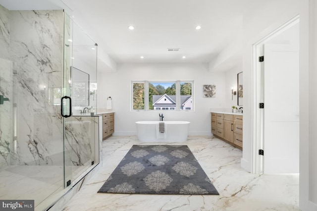 full bathroom featuring recessed lighting, marble finish floor, vanity, and a marble finish shower