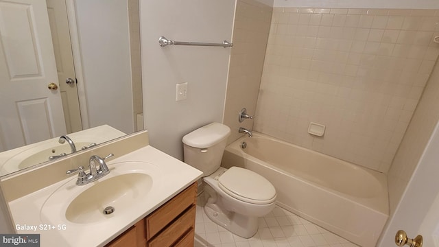 bathroom with tile patterned flooring, shower / bath combination, vanity, and toilet