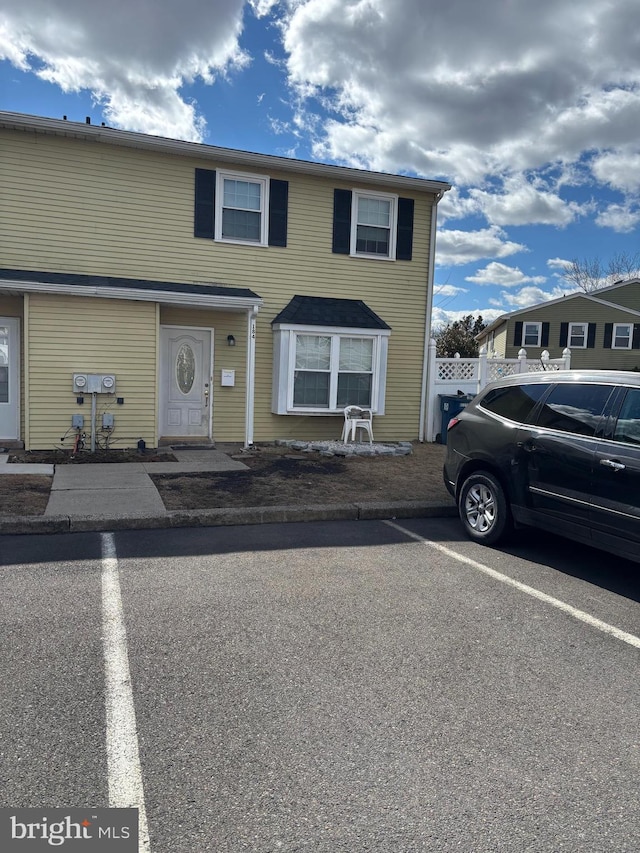 view of front of property with uncovered parking