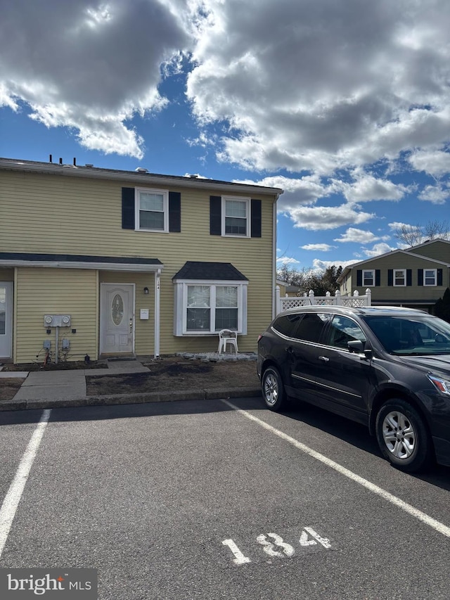 view of front of property with uncovered parking