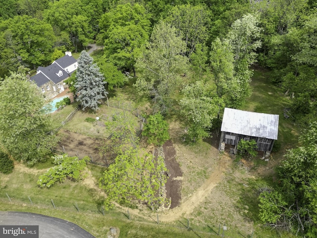 aerial view featuring a view of trees