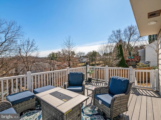 deck featuring an outdoor living space