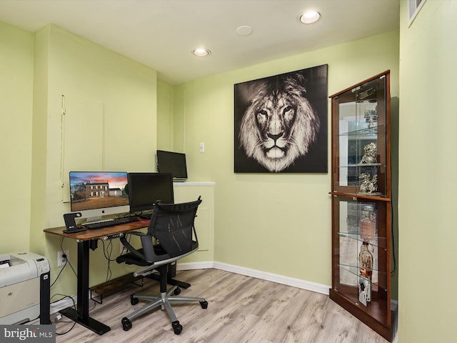 office area featuring recessed lighting, baseboards, and wood finished floors