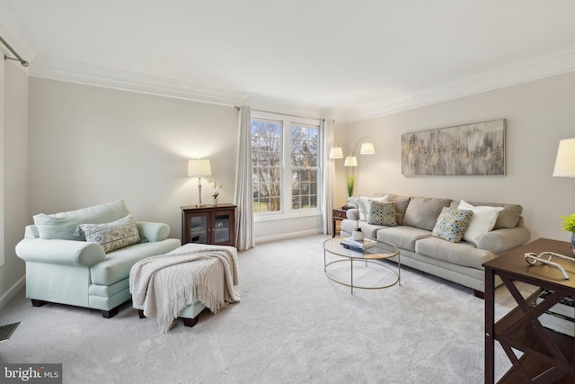 carpeted living area featuring visible vents, ornamental molding, and baseboards