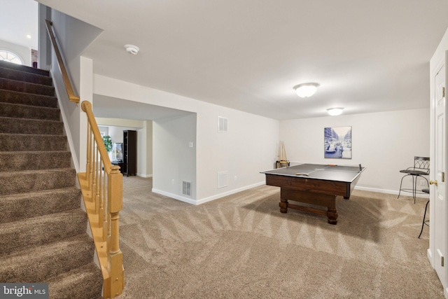 game room with carpet, visible vents, and baseboards