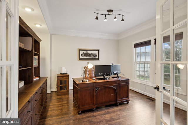 office space featuring dark wood-style floors, baseboards, and crown molding