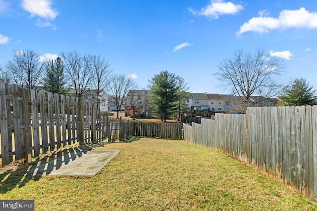 view of yard featuring a fenced backyard