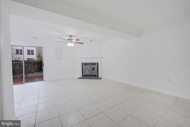 unfurnished living room featuring a fireplace with flush hearth, light tile patterned flooring, ceiling fan, and baseboards