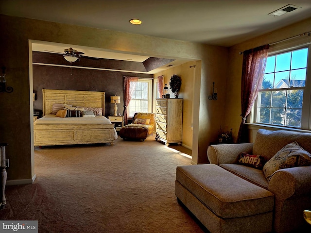 bedroom featuring carpet, visible vents, and baseboards