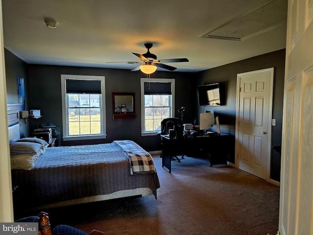 bedroom with carpet floors, a ceiling fan, and baseboards