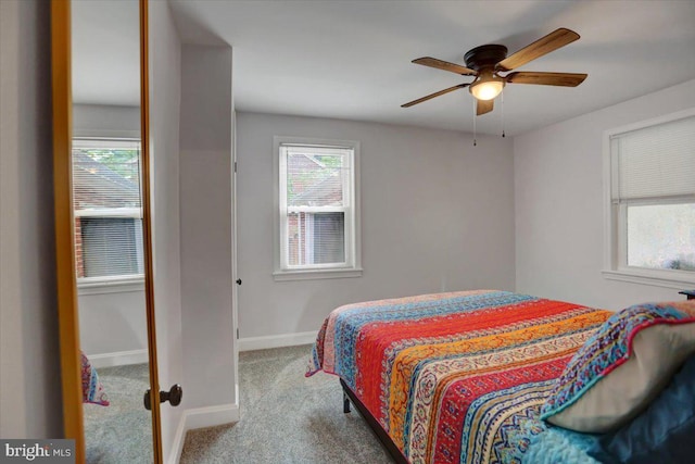 bedroom featuring carpet, ceiling fan, and baseboards