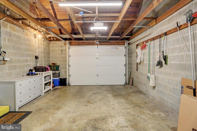 garage with concrete block wall