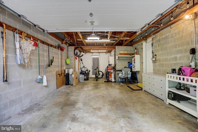 garage featuring concrete block wall