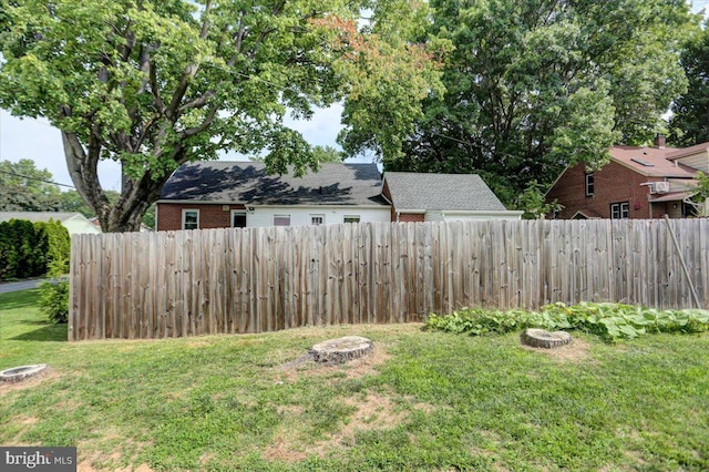 view of yard with fence