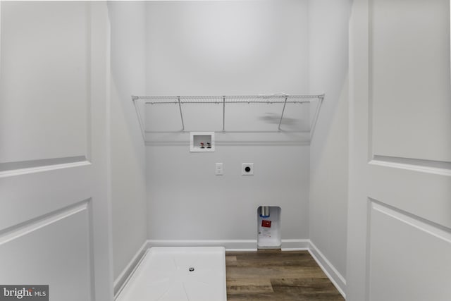 clothes washing area featuring laundry area, washer hookup, baseboards, dark wood-style floors, and electric dryer hookup