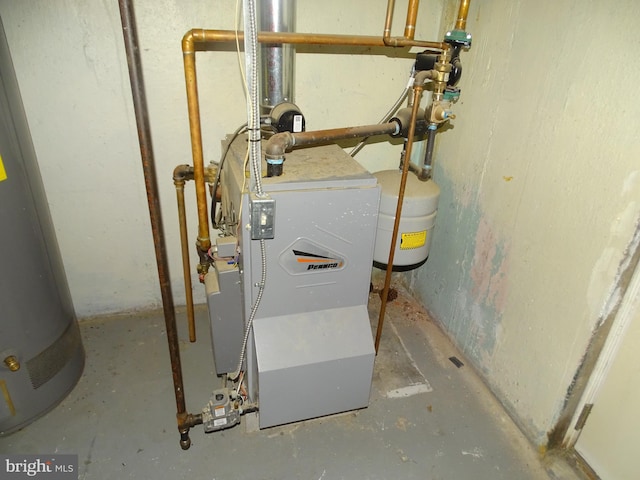 utility room with water heater